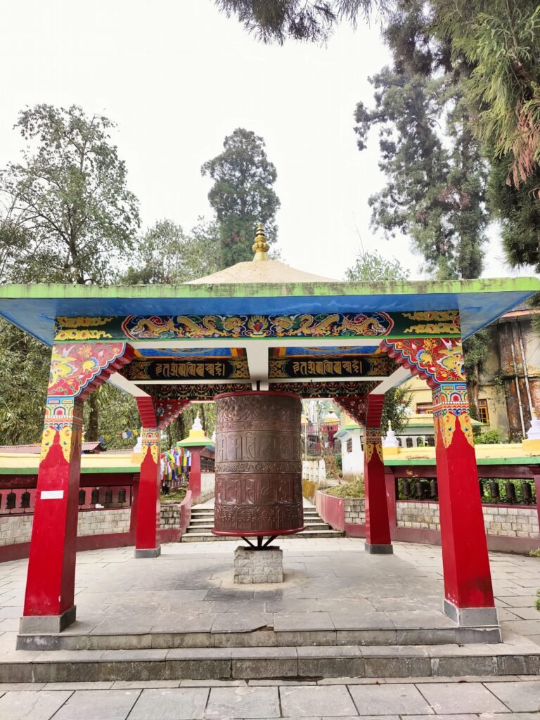 large prayer wheel at enchey monastery
