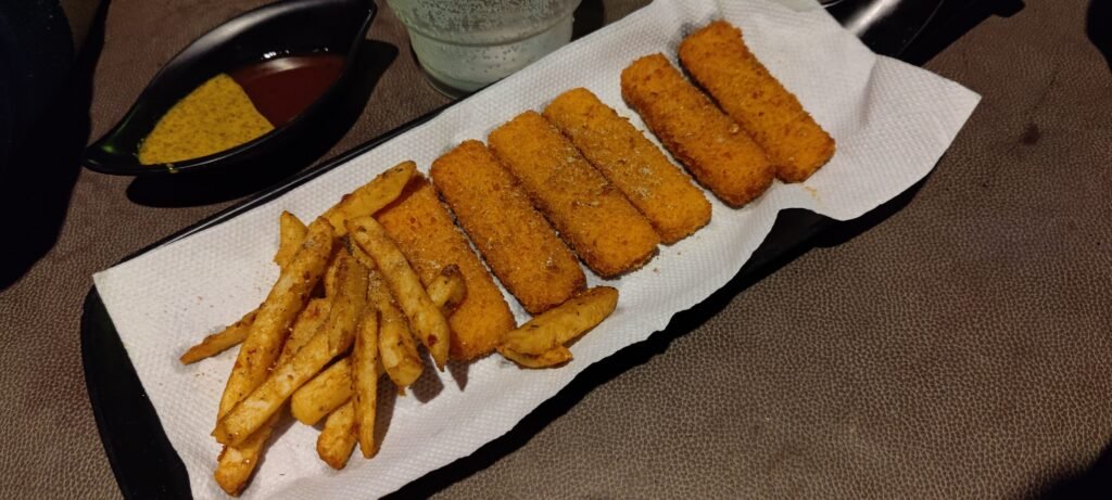 Fish fry with fries by the pool