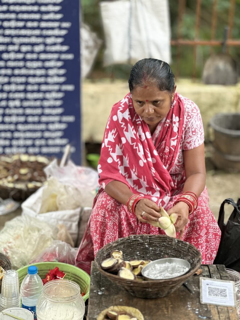 Lady selling diyas with ghee at Nageswar Tangi mandir Bhubaneswar